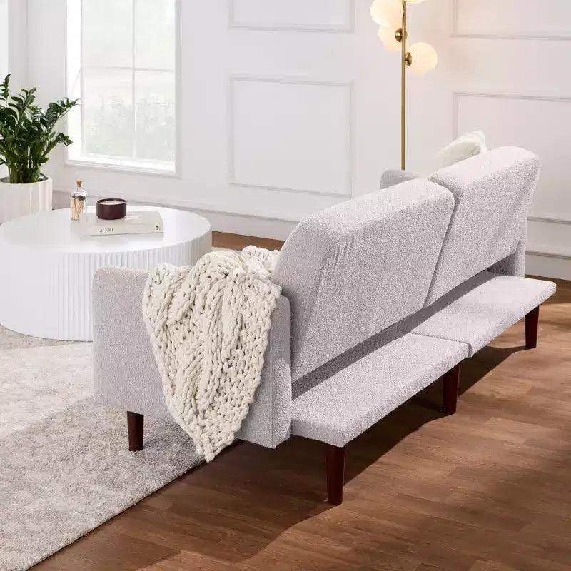 Futon convertibile curvo, divano letto con schienale sdoppiato in tessuto bouclé
