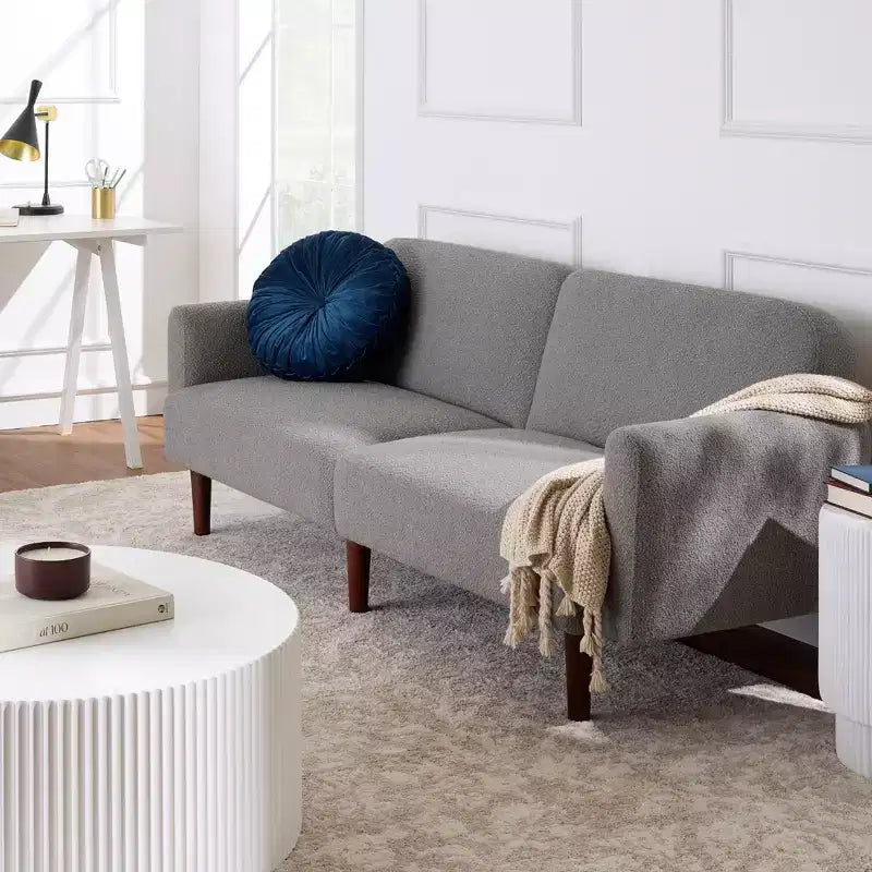 Futon convertibile curvo, divano letto con schienale sdoppiato in tessuto bouclé